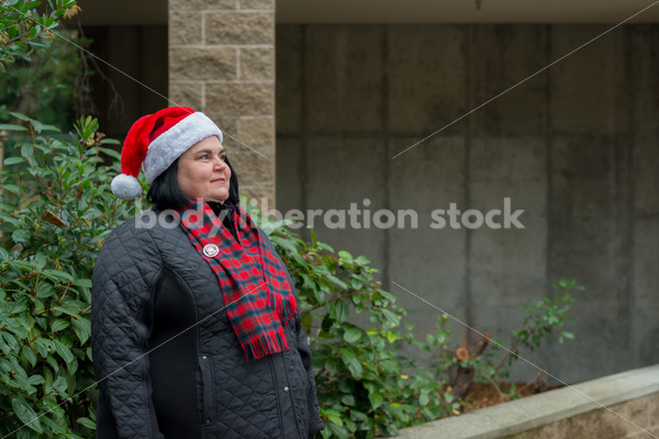 Christmas Stock Photo: Plus Size Teacher in Santa Hat - Body Liberation Photos