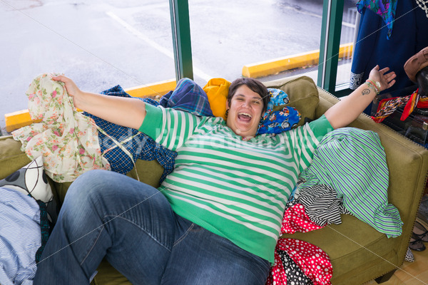 Retail Stock Photo: Plus Size Woman Shops for Clothing - Body Liberation Photos