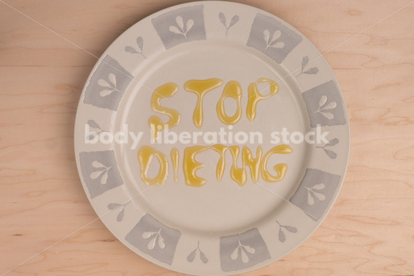 Stock Photo: Diet Recovery Concept STOP DIETING Spelled Out on Plate - Body Liberation Photos