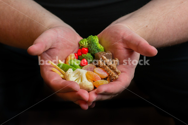 Stock Photo: Dieting Recovery Concept Man’s Hands Full of Food - Body Liberation Photos