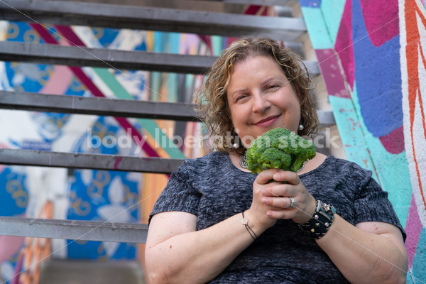 Anti-Diet Stock Photo: Playing with Broccoli