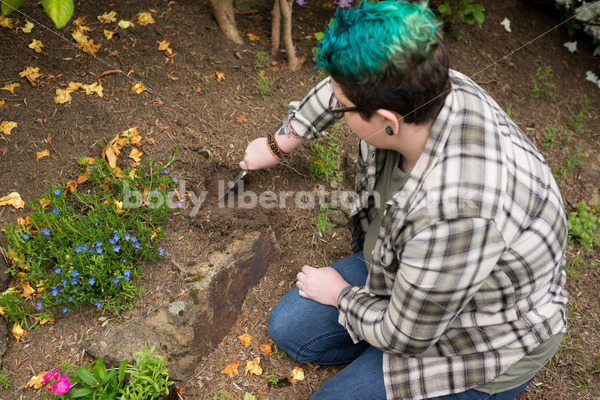 Diverse Gardening Stock Photo: Agender Person Digs with Trowel - Body Liberation Photos