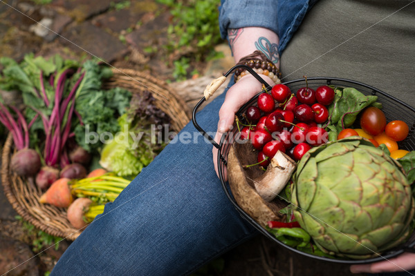 Diverse Gardening Stock Photo: Agender Person Holds Basket of Fresh Produce - Body Liberation Photos