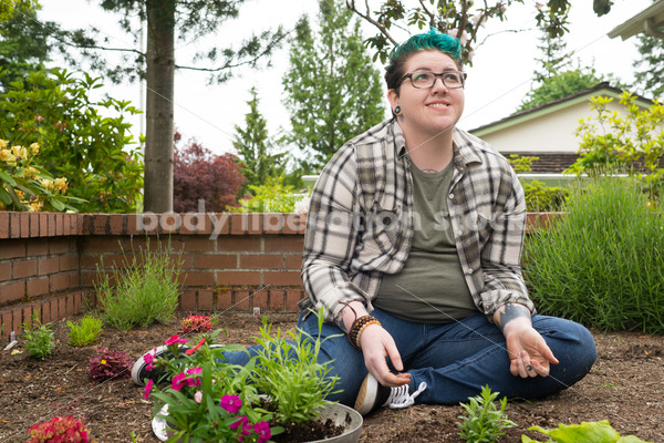 Diverse Gardening Stock Photo: Agender Person Plants Seedling - Body Liberation Photos
