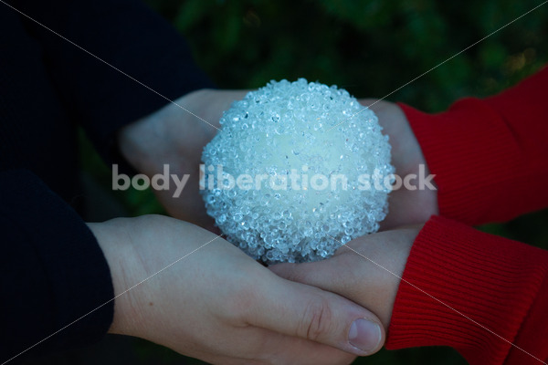 Holiday Stock Image: Plus-Size Couple with Christmas Tree Ornaments - Body Liberation Photos