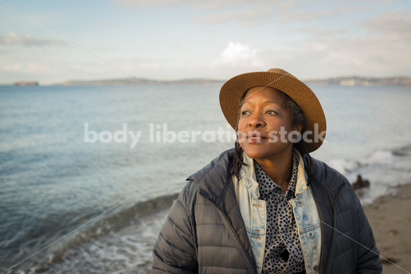Plus-Size African American Woman Outdoors - Body Liberation Photos & Stock