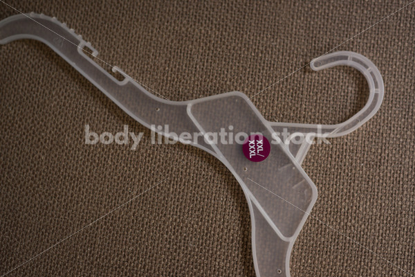 Plus-size clothing hangers - Body Liberation Photos