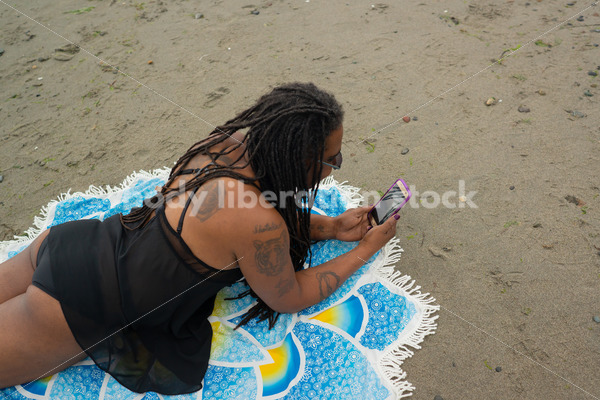 Technology Stock Image: Smartphone on the Beach - Body Liberation Photos & Stock
