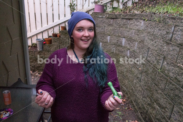 A young caucasian woman smokes legal marijuana in Washington state - Body Liberation Photos