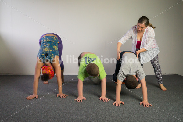 Diverse Yoga Stock Photo: Family Yoga - Body Liberation Photos & Stock