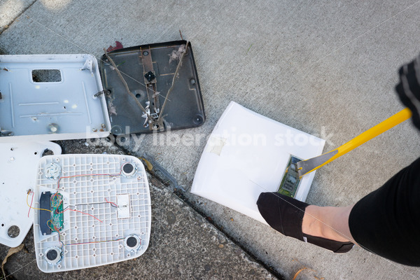 Eating Disorder Recovery Stock Photo: Scale Smashing - Body Liberation Photos
