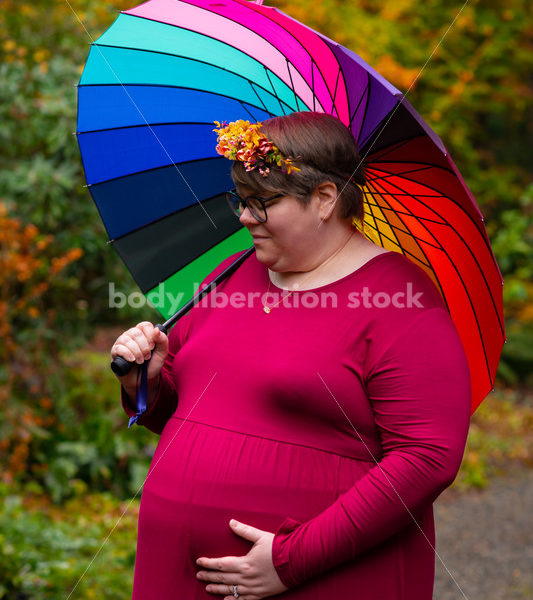 Body-Positive Pregnancy Stock Photo: Rainbow Umbrella