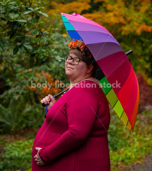 Body-Positive Pregnancy Stock Photo: Rainbow Umbrella