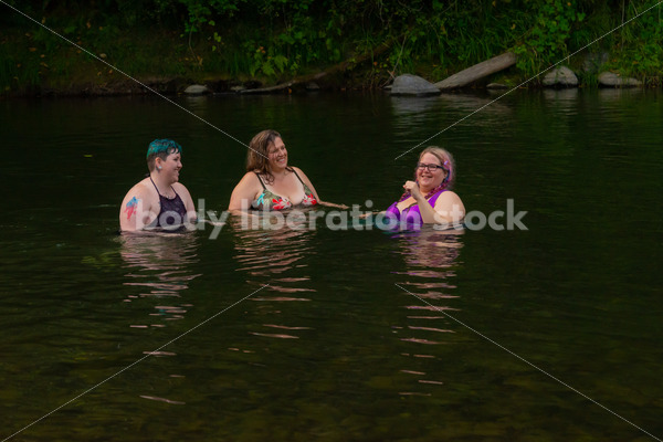 Summer Fun & Community Stock Photo: People Swimming in River