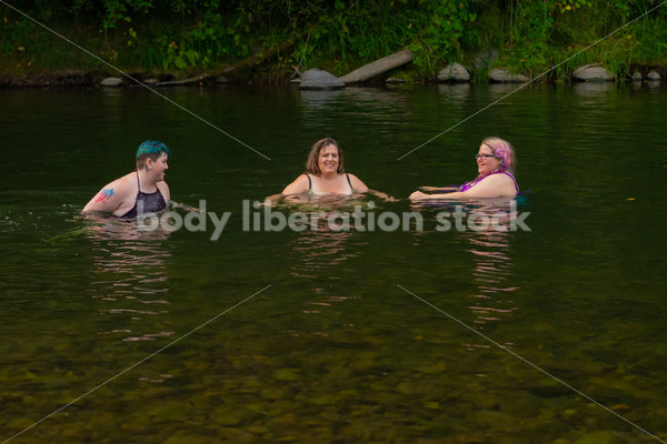 Summer Fun & Community Stock Photo: People Swimming in River