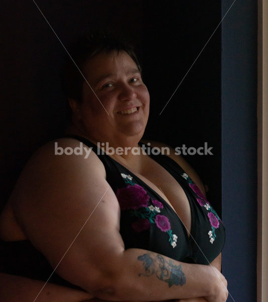 Plus Size Stock Photo: Woman in Dark Room